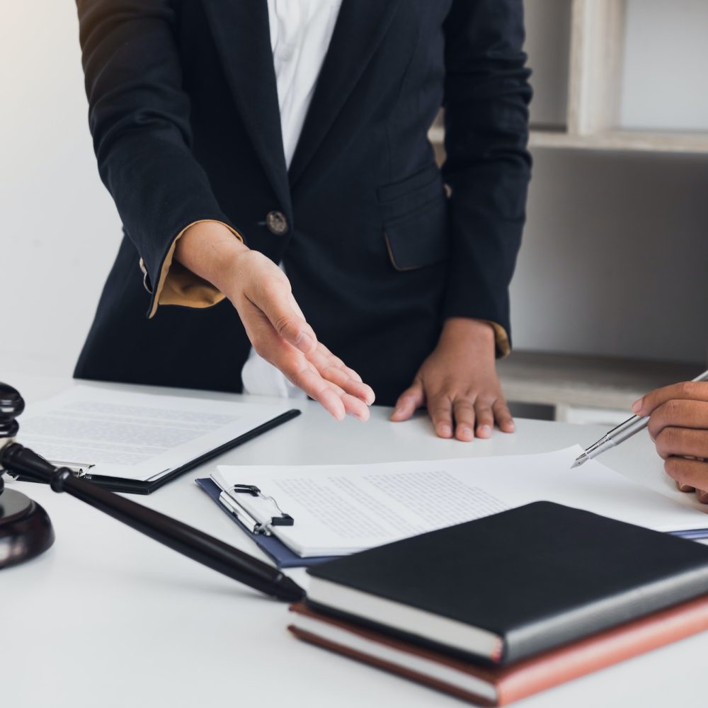Business lawyer is currently counseling the client's trial at the lawyer office.